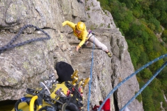 The station at the end of pitch 4. It is better to split that pitch in two. Save a #4 cam for the belay right after the overhang and get ready to be crammed in the crack:)